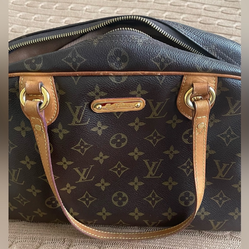 Louis Vuitton, authentic in mint condition